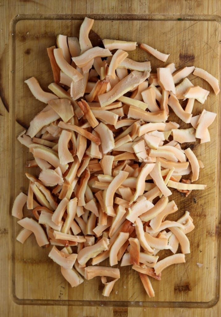 Image showing how to slice the chicken of the woods mushroom for chicken of the woods pie recipe.